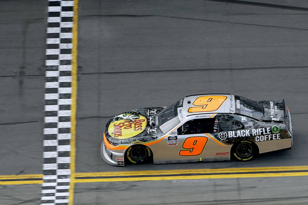 Noah Gragson (9) prepares to cross the finish line to win the NASCAR Xfinity series auto race S ...