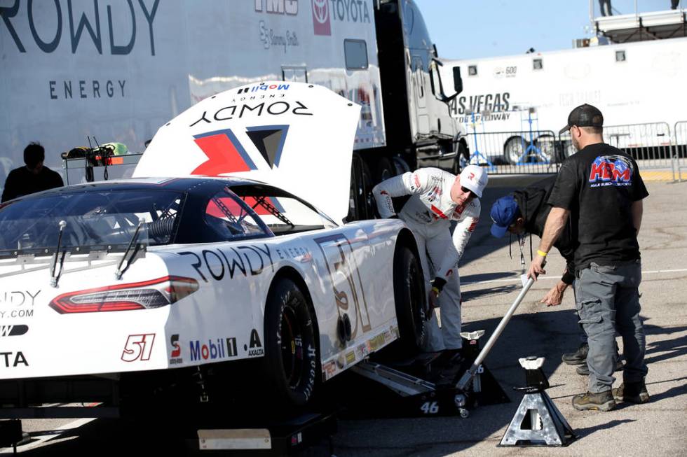 Las Vegas native and reigning NASCAR Cup Series champion Kyle Busch works on his car between pr ...