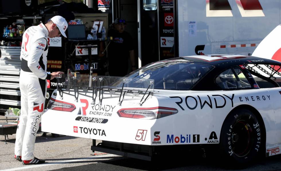 Las Vegas native and reigning NASCAR Cup Series champion Kyle Busch works on his car between pr ...