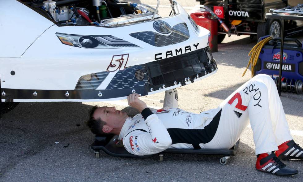 Las Vegas native and reigning NASCAR Cup Series champion Kyle Busch works on his car between pr ...