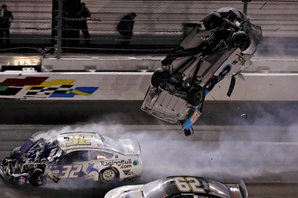 Ryan Newman (6) goes airborne after crashing into Corey LaJoie (32) during the NASCAR Daytona 5 ...