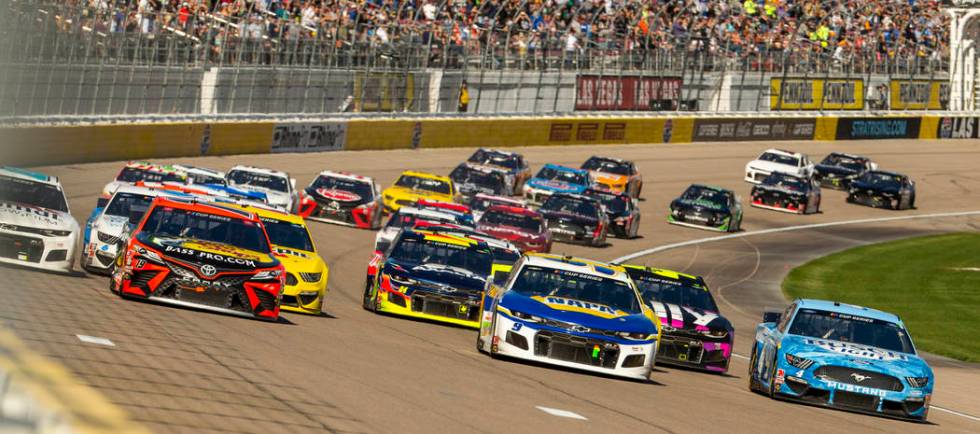 Cars pack up on another start during the Pennzoil 400 presented by Jiffy Lube, a NASCAR Cup Ser ...