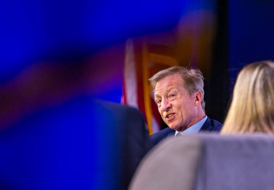 Businessman Tom Steyer, left, answers questions from The Wall Street Journal's Jeanne Cummings ...