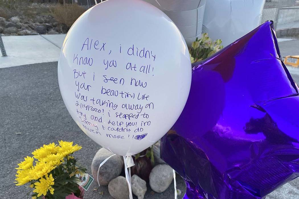 A memorial for a brother and sister hit by a truck on Friday, Feb. 14, 2020, sits next to a cro ...