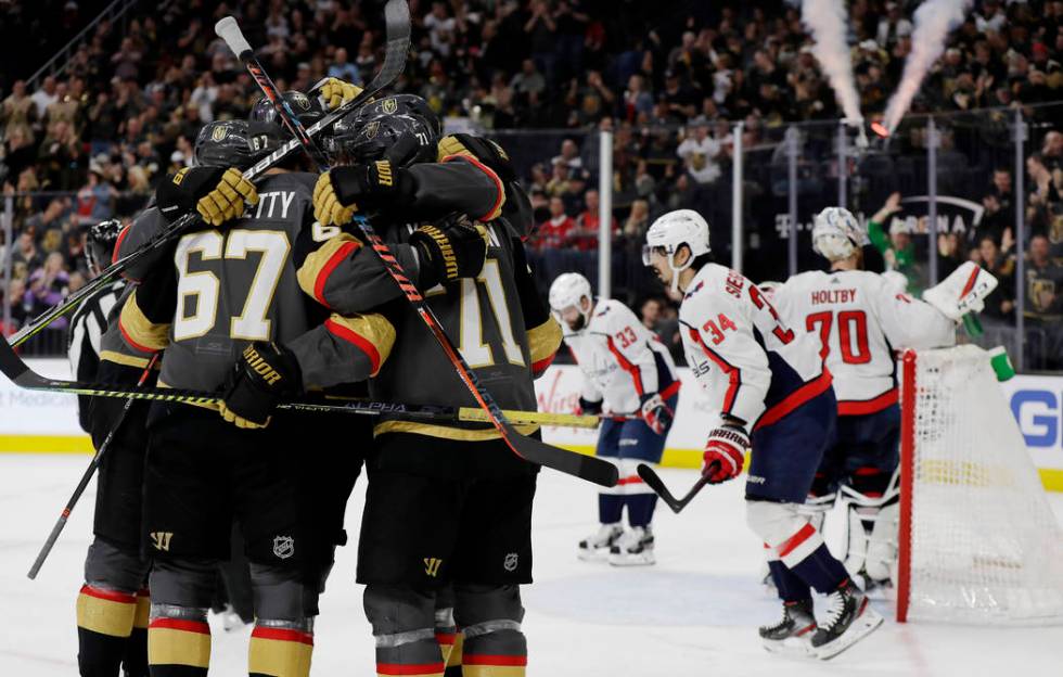 Vegas Golden Knights left wing Max Pacioretty (67) celebrates with teammates after scoring agai ...