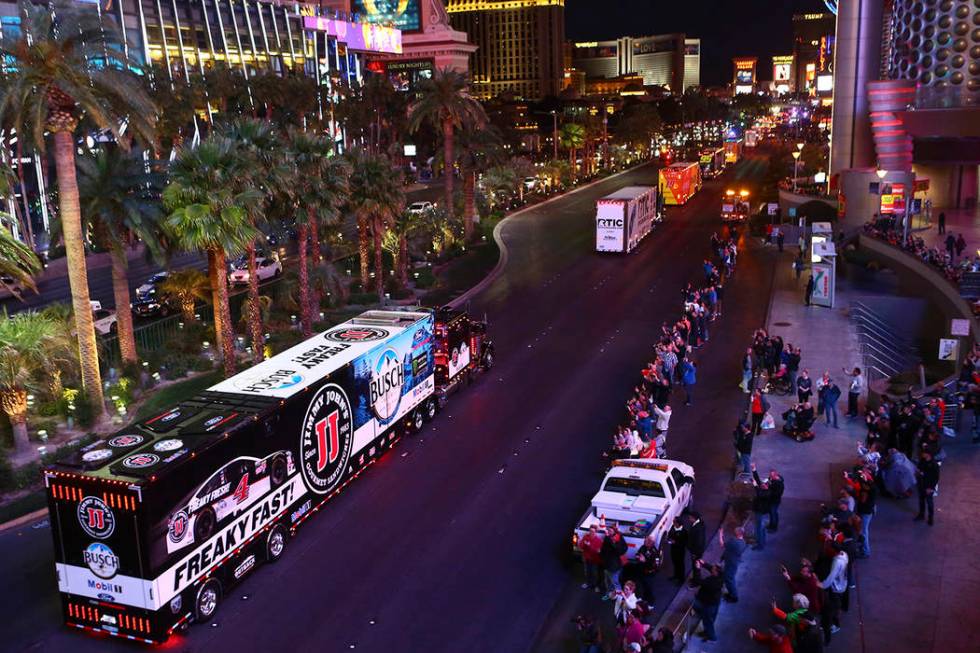 The hauler of Kevin Harvick (4) parades down the Las Vegas Strip near Harmon Road ahead of the ...