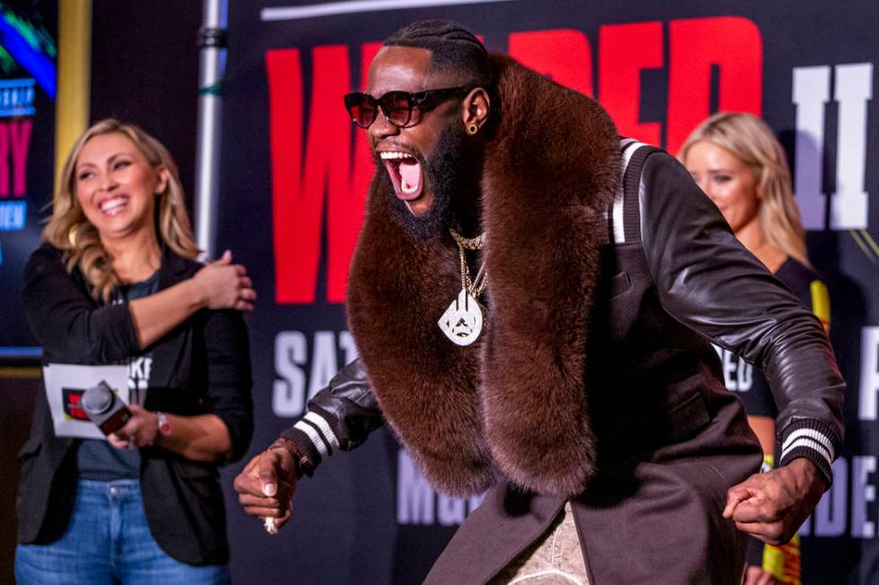 WBC heavyweight title fighter Deontay Wilder yells for the crowd while on stage during the Gran ...