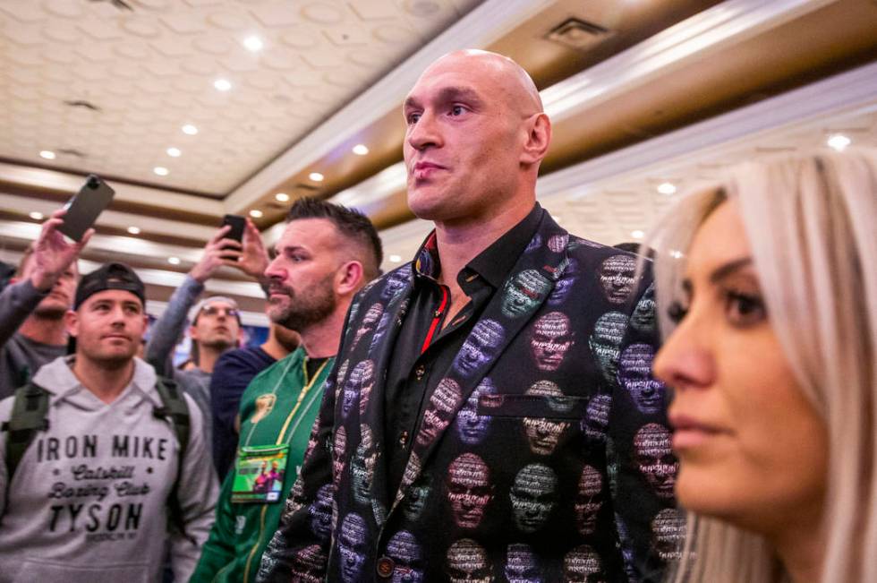 WBC heavyweight title fighter Tyson Fury makes his way to the stage during the Grand Arrivals f ...