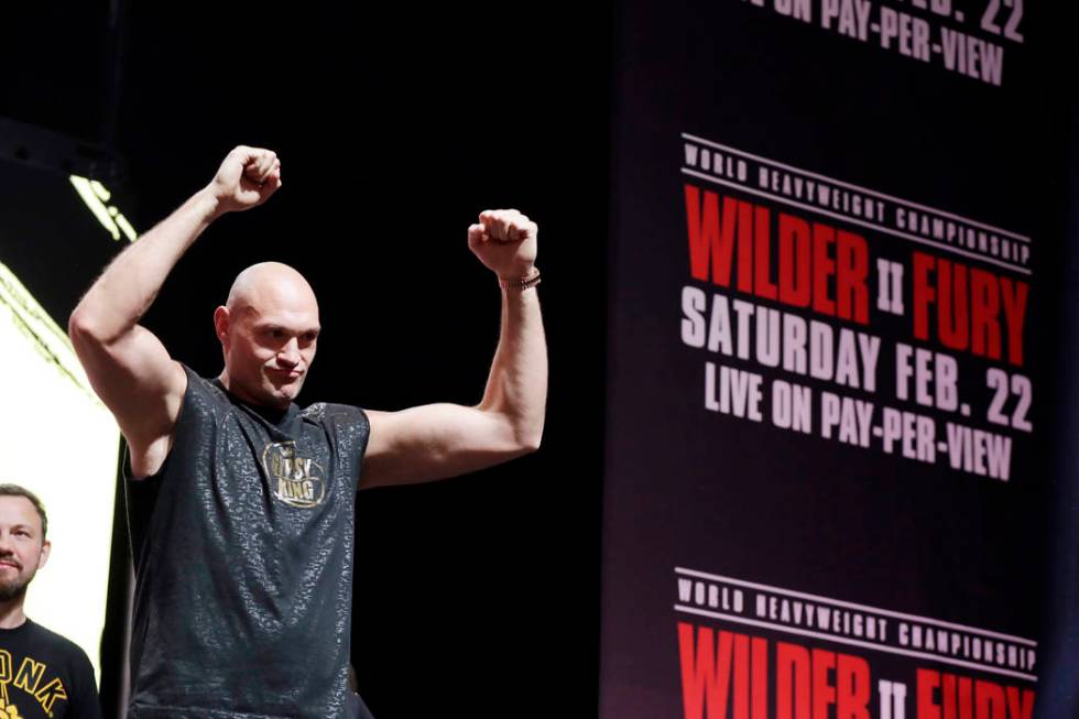 Tyson Fury, of England, attends a weigh-in for his WBC heavyweight championship boxing match ag ...