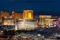 The Strip skyline lights up at dusk as seen from the VooDoo Lounge atop the Rio hotel-casino in ...