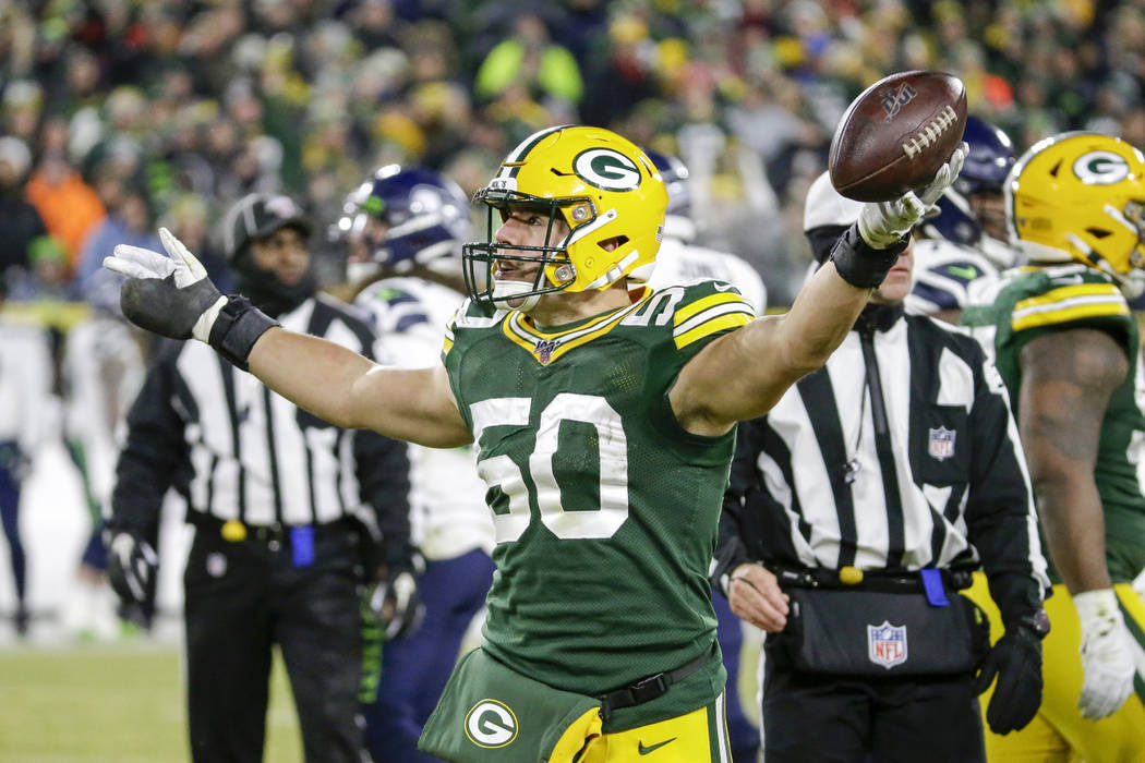 Green Bay Packers' Blake Martinez reacts after a third down stop during the first half of an NF ...