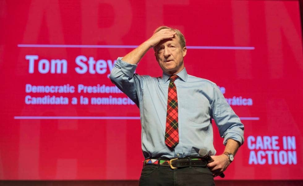 Democratic presidential candidate Tom Steyer listens as a question is presented during a Care i ...