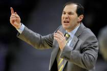 Baylor head coach Scott Drew directs this team during the first half of an NCAA college basketb ...