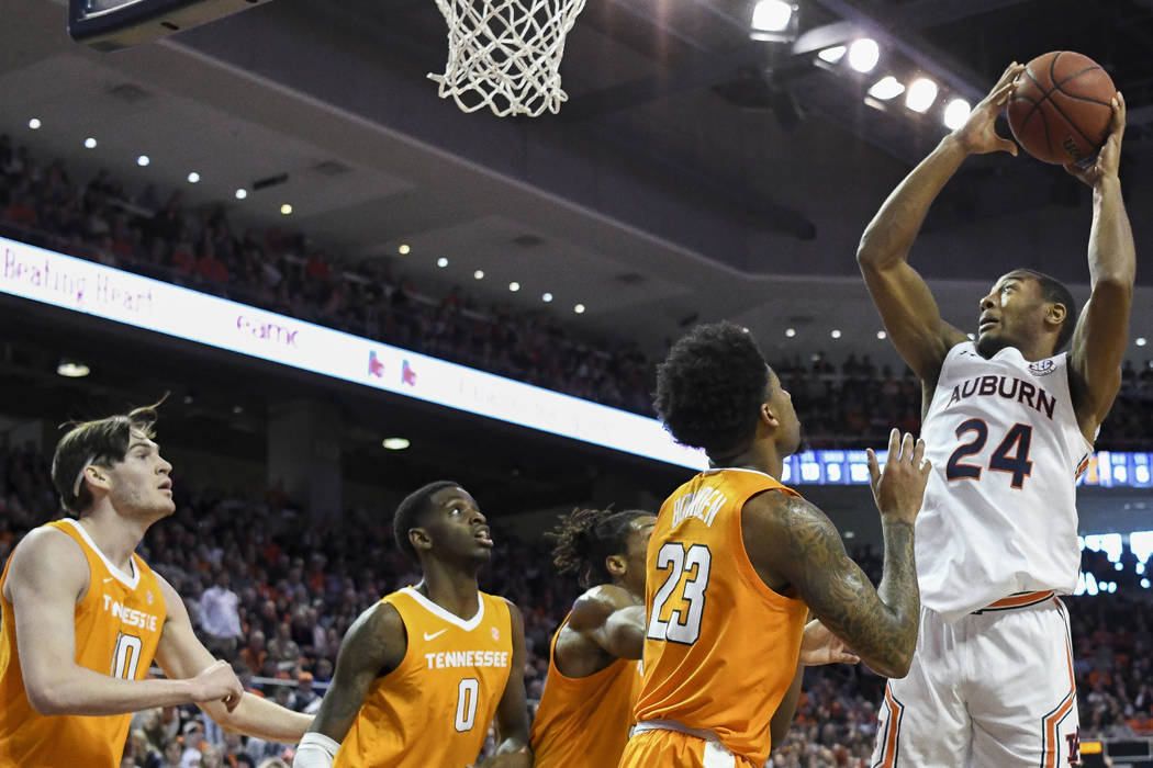 Auburn forward Anfernee McLemore (24) shoots over Tennessee during the second half of an NCAA c ...