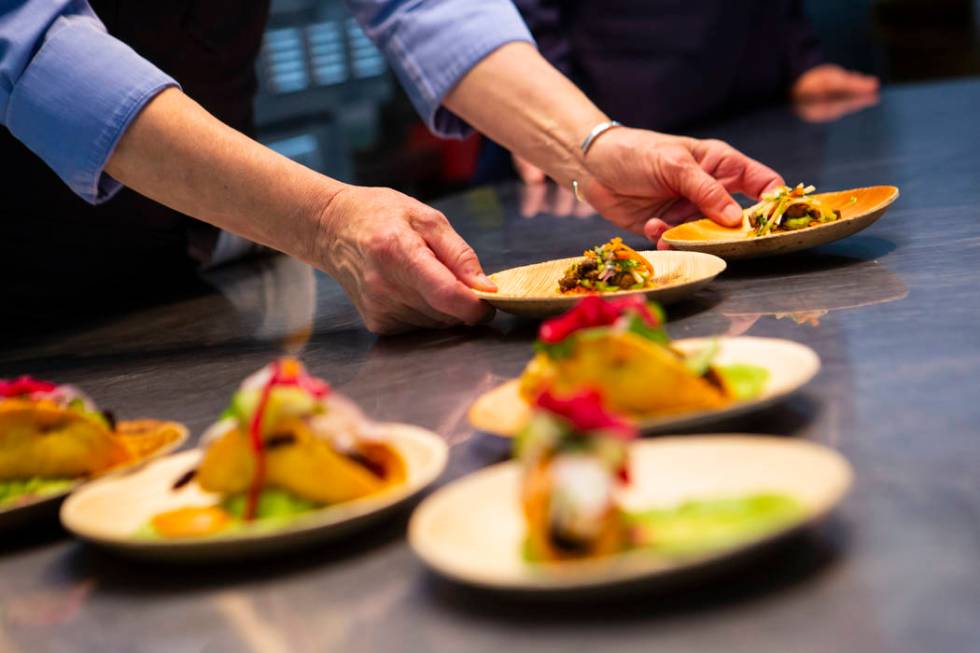 Mary Sue Milliken, of Border Grill, serves up vampiro asada tostadas during a culinary celebrat ...