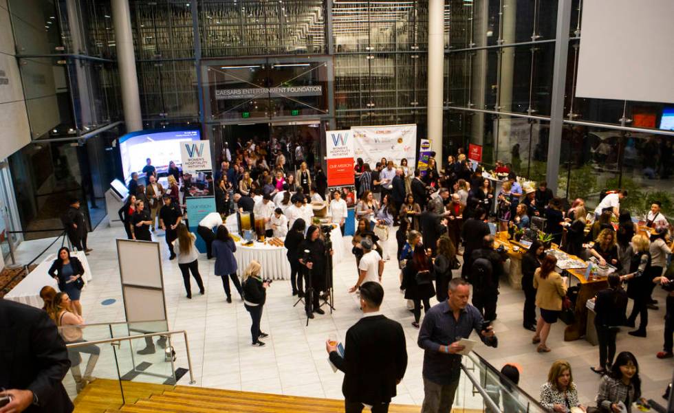 Attendees arrive for a culinary celebration held by the Women's Hospitality Initiative at UNLV' ...