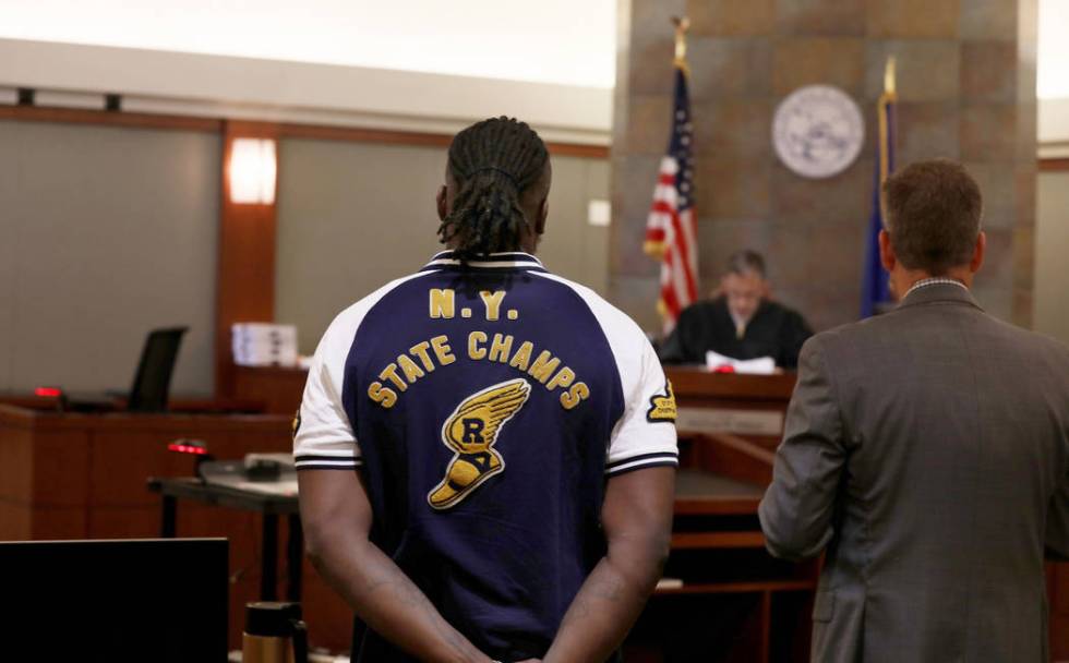 Durwin Allen, left, appears in court to set a new trial date with attorney Peter S. Christianse ...