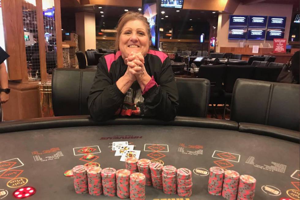 Dorothy Boone of Temple, Texas, is all smiles after she hit a Three Card Poker progressive jack ...