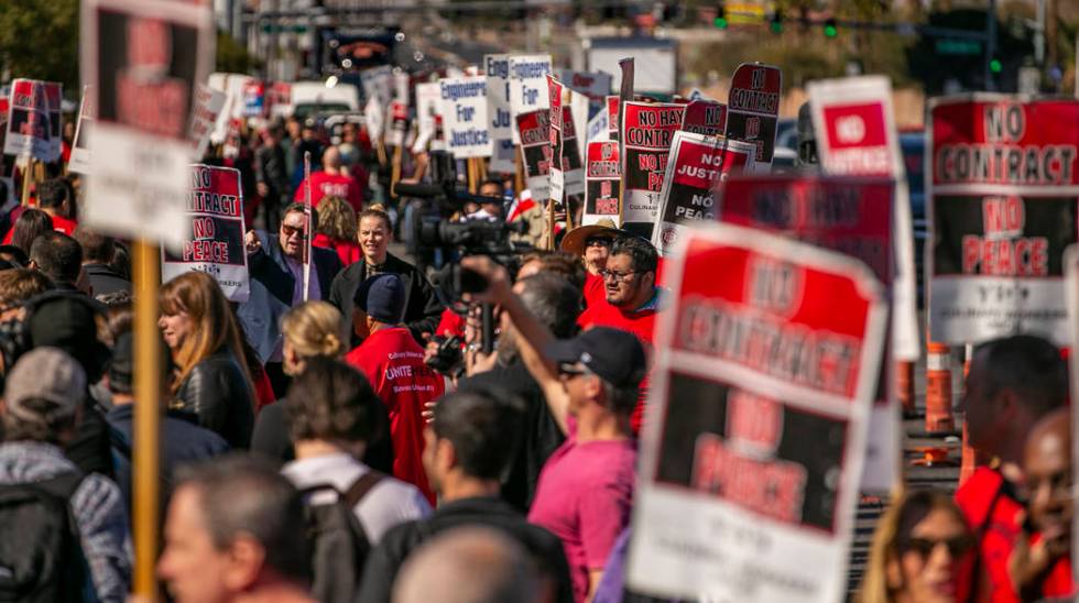 Workers from seven Station Casinos' properties walk a picket line while fighting for a union co ...