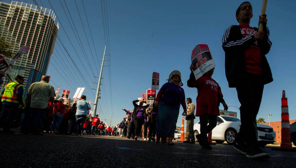 Workers from seven Station Casinos' properties walk a picket line while fighting for a union co ...