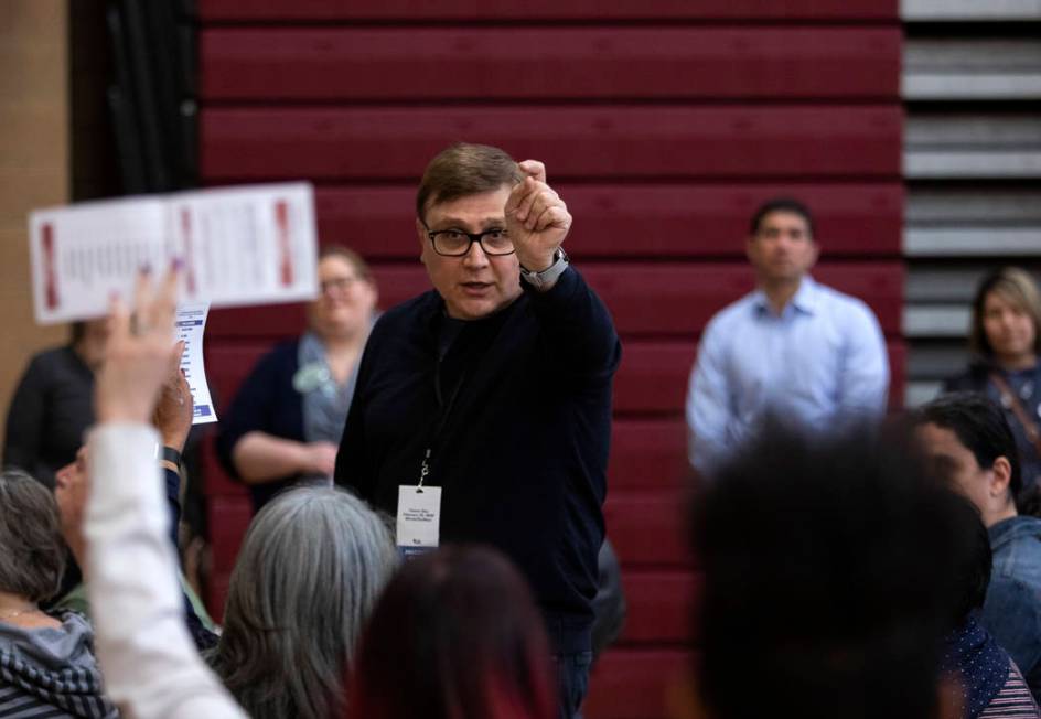A precinct captain counts ballots at the Nevada caucus at Desert Oasis High School on Saturday, ...