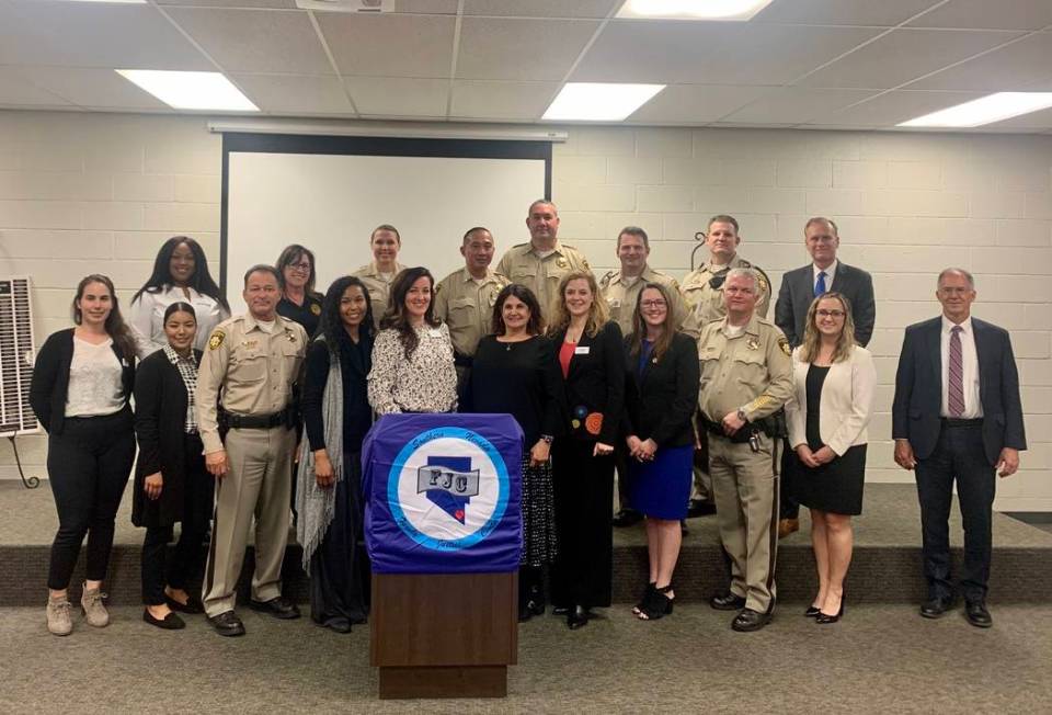 Law enforcement and local advocacy groups gathered at the Southern Nevada Family Justice Center ...