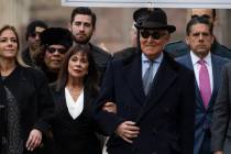 Roger Stone with accompanied by his wife Nydia Stone, second from left, arrives at federal cour ...