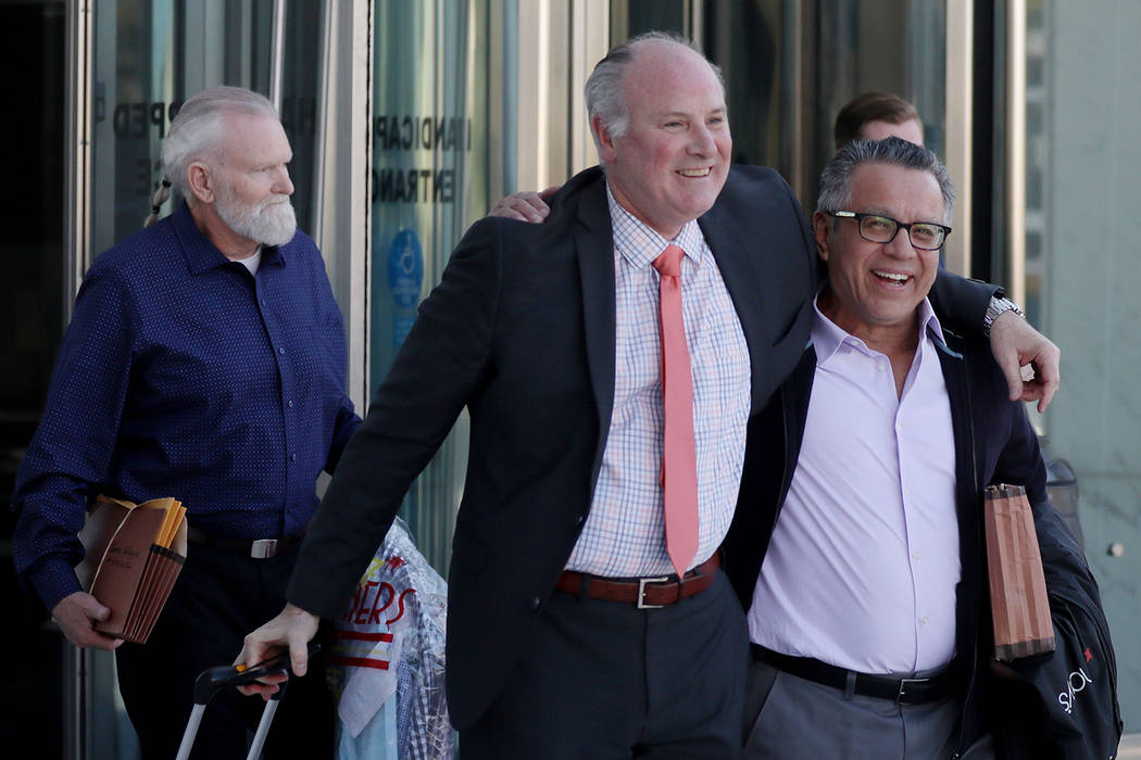 Defendant James Gillespie, left, attorney Michael Kennedy, center, and defendant Ernesto Gonzal ...