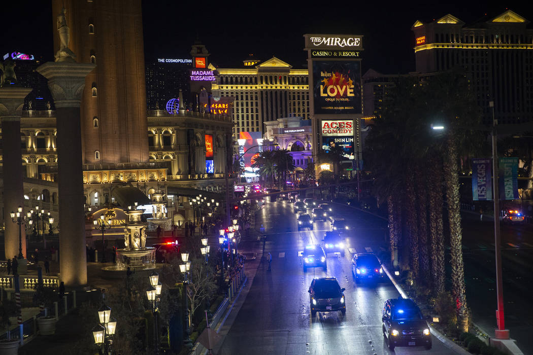 President Donald Trump, bottom/left, drives north on the Strip outside The Venetian with a ...