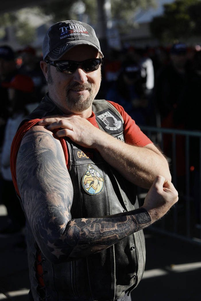 Doug Durbin of Las Vegas shows off his tattoo before a President Trump campaign rally Friday, F ...