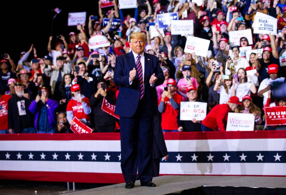 President Donald Trump arrives for a rally at the Las Vegas Convention Center in Las Vegas on F ...