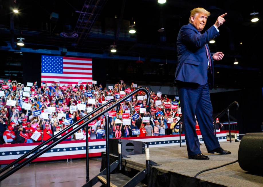 President Donald Trump arrives for a rally at the Las Vegas Convention Center in Las Vegas on F ...