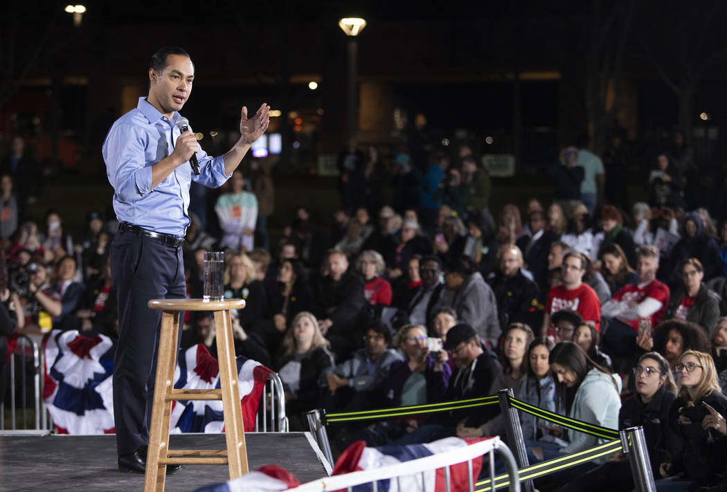 Julian Castro speaks ahead of Sen. Elizabeth Warren, D-Mass., at the "Get Out the Caucus B ...