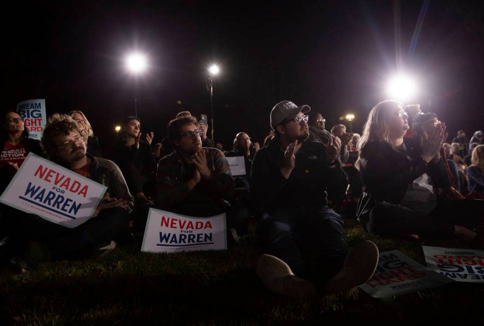 The audience claps for Sen. Elizabeth Warren, D-Mass., at the "Get Out the Caucus Block Pa ...