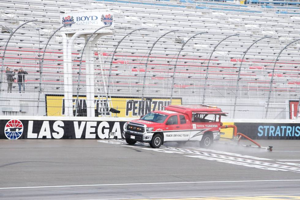 A jet dryer attempts to dry the track after a rain delay before the start of NASCAR Xfinity Ser ...