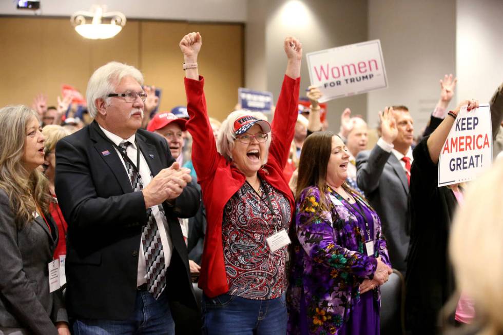 Nevada Republican Central Committee members, including from left, Joe Burdzinski, Debra Strickl ...