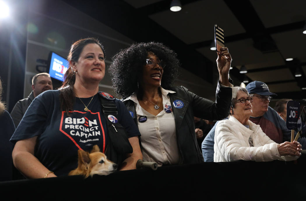 Supporters cheer for Joe Biden as he speaks during a caucus night event at IBEW local 357 in La ...