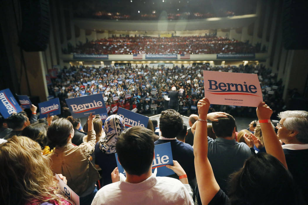 Supporters for Democratic presidential candidate Sen. Bernie Sanders, I-Vt., cheer during a ral ...