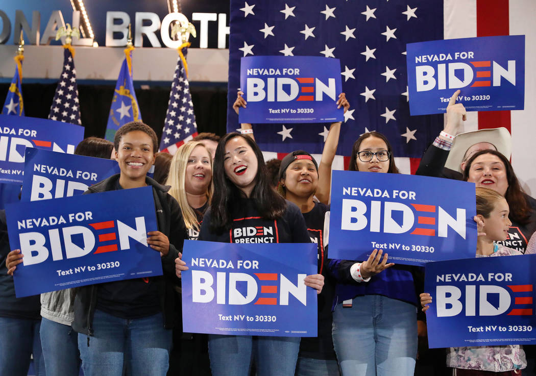 Supporters chant for presidential candidate former Vice President Joe Biden speaks during a cau ...