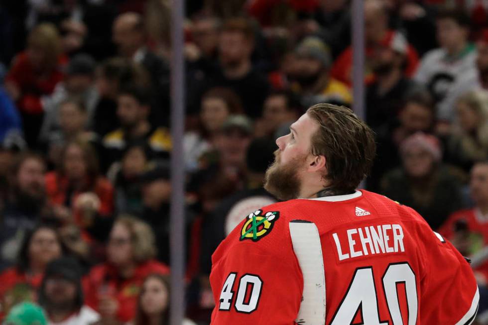 Chicago Blackhawks goalie Robin Lehner looks up the score board during the first period of an N ...