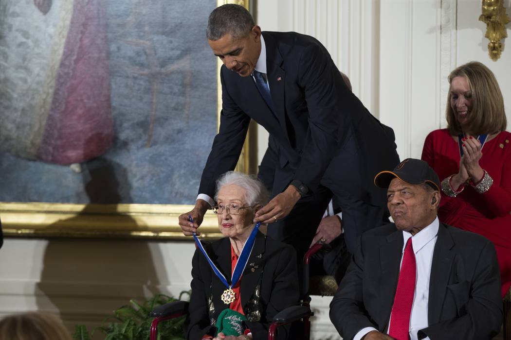 In a Nov. 24, 2015, photo, Willie Mays, right, looks on as President Barack Obama presents the ...