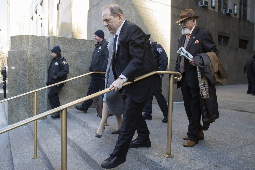 Harvey Weinstein leaves the courthouse during jury deliberations in his rape trial, Friday, Feb ...