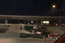 Police investigate a semitrailer rollover Monday, Feb. 24, 2020, on a ramp connecting U.S. High ...