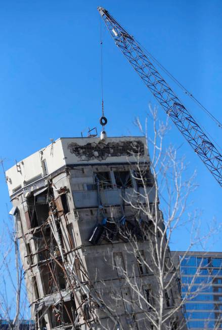 A wrecking ball smashes against the "Leaning Tower of Dallas" north of downtown Dalla ...