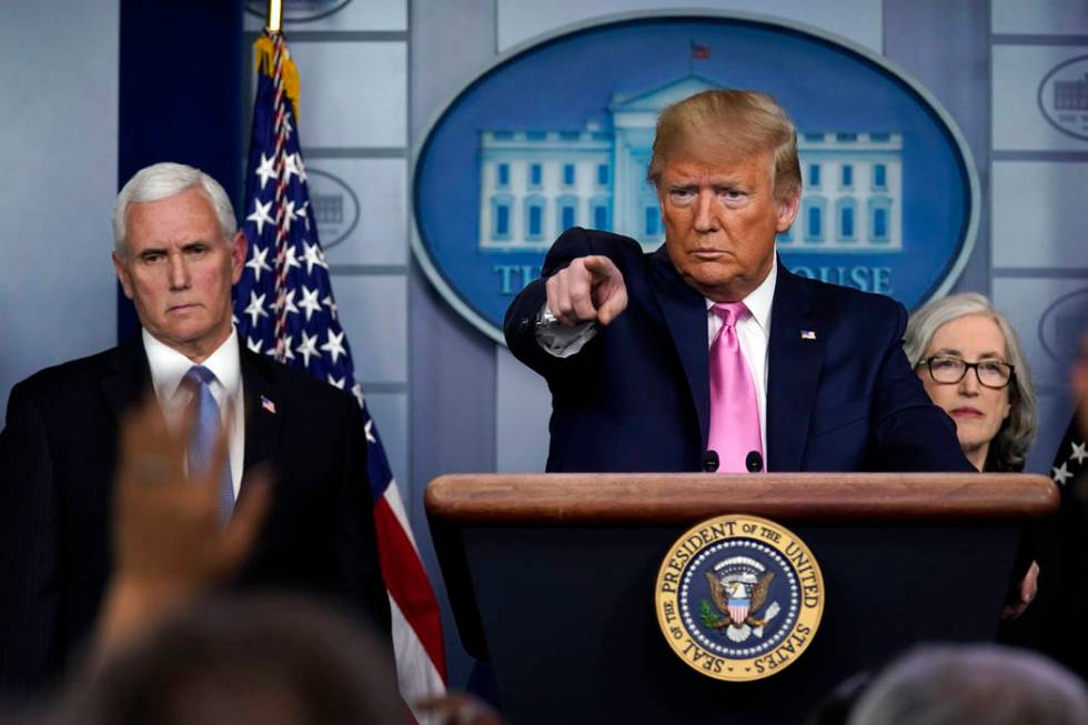 President Donald Trump, with members of the president's coronavirus task force, speaks during a ...