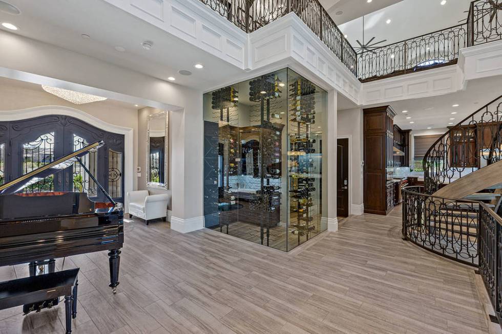 A wine cellar off the main entry can store 800-plus bottles. (Ivan Sher Group)