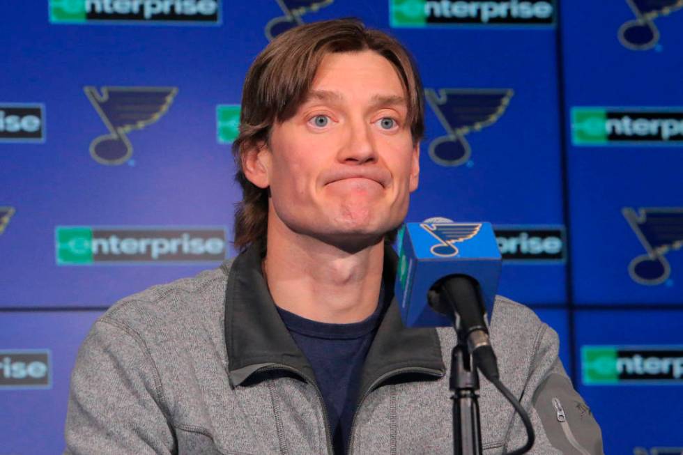 St. Louis Blues defenseman Jay Bouwmeester reacts to a question about his injury during a press ...