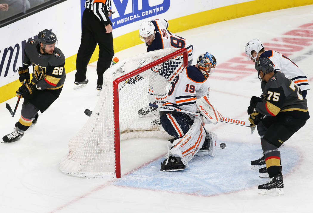 Edmonton Oilers goaltender Mikko Koskinen (19) makes a save against Vegas Golden Knights right ...
