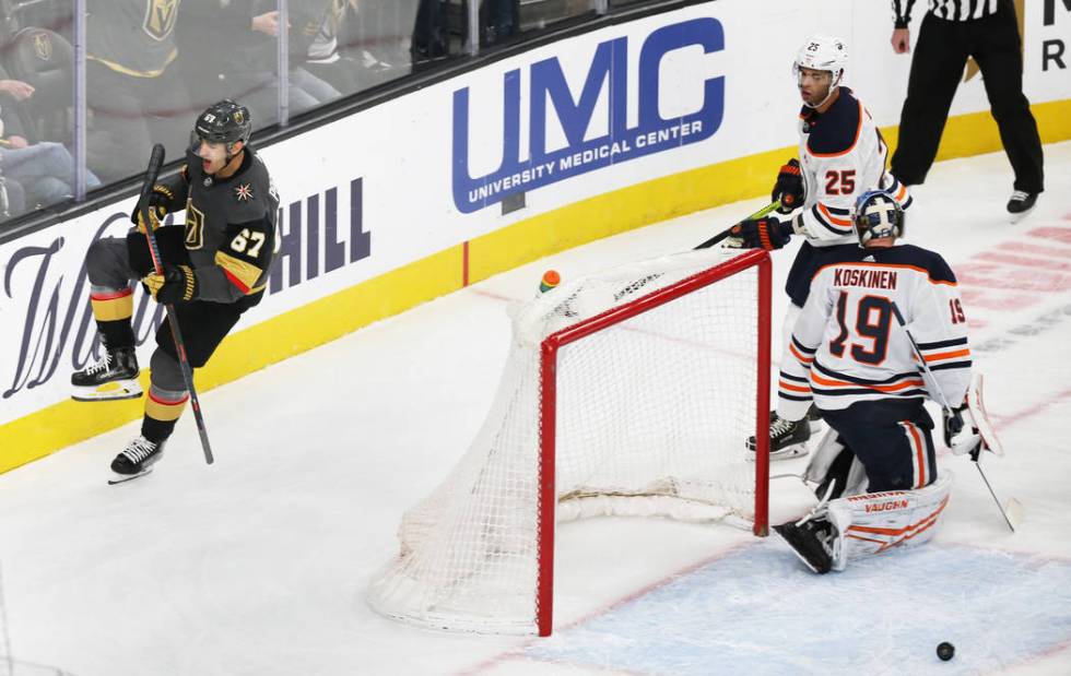 Vegas Golden Knights left wing Max Pacioretty (67) scores against Edmonton Oilers goaltender Mi ...