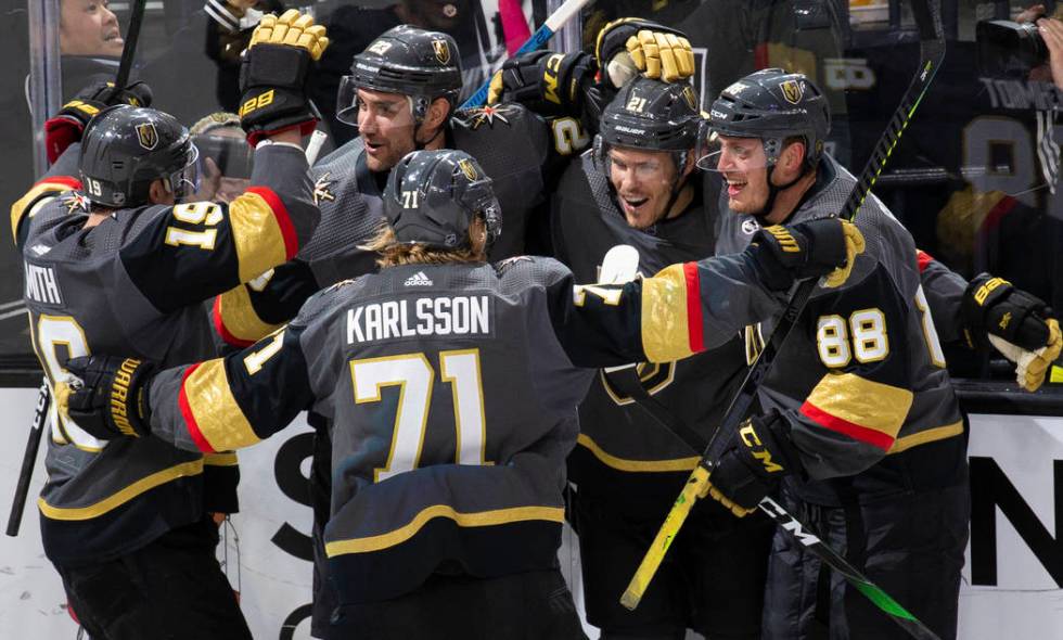 Vegas Golden Knights right wing Reilly Smith (19), Vegas Golden Knights center William Karlsson ...